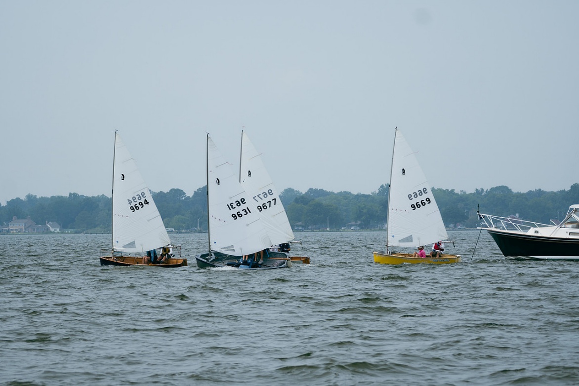 The Penguin fleet racing on the Choptank at the 2026 Admiral Byrd Regatta